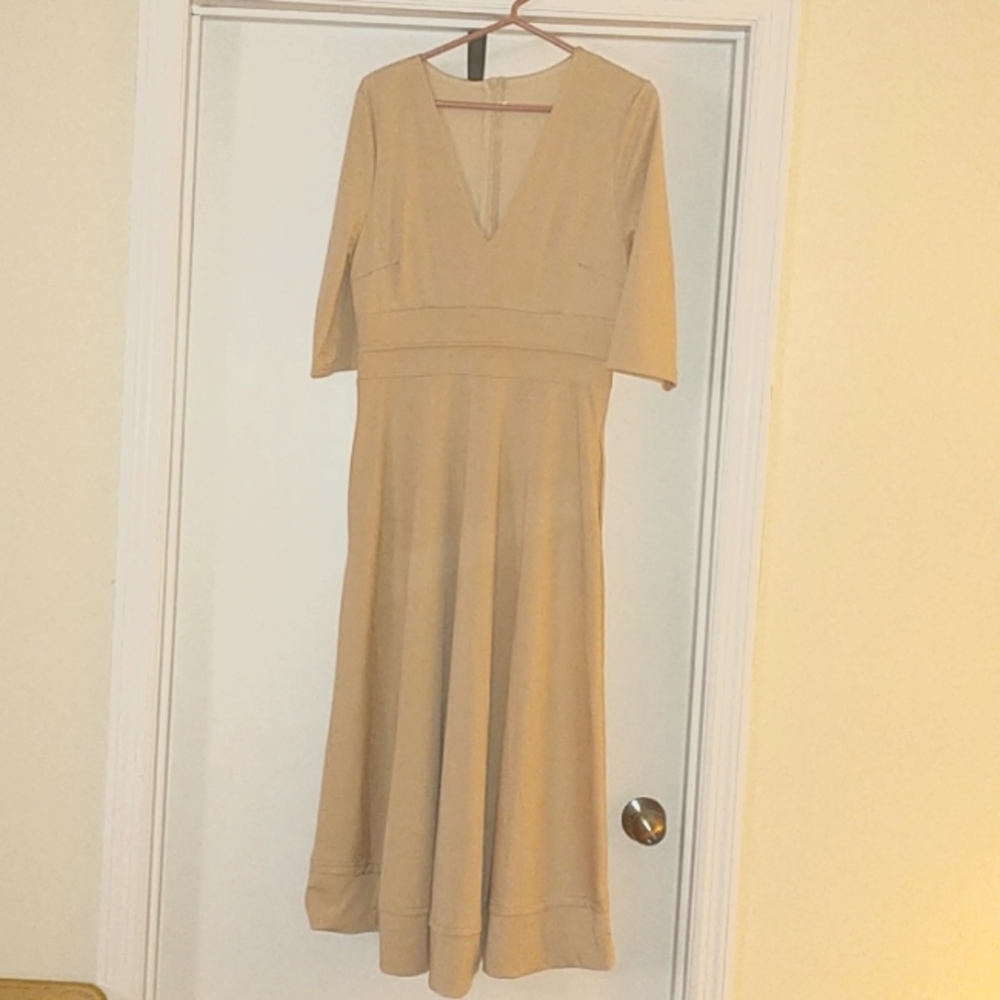 Blush v-neck formal dress with 3/4 sleeves and pockets